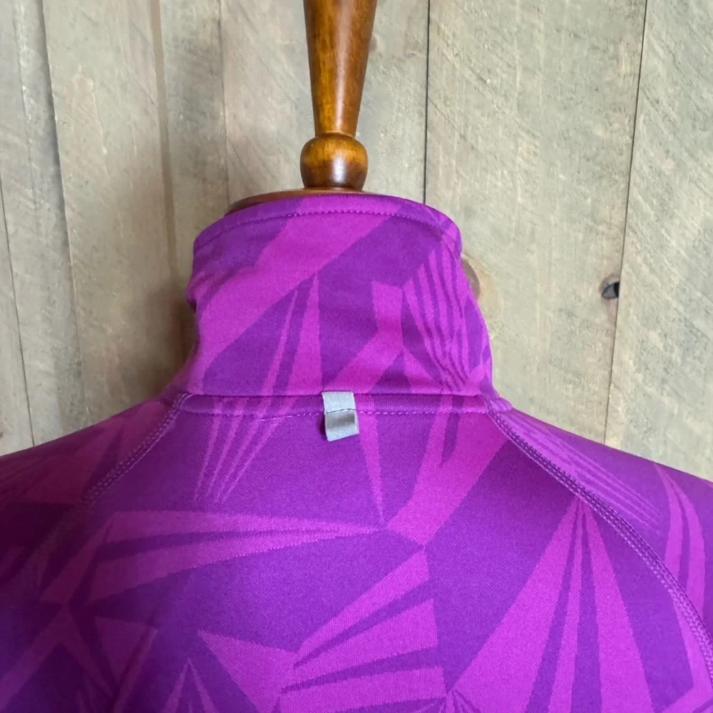 Nike Dri-Fit running top with reflective details Size Medium Magenta / pink